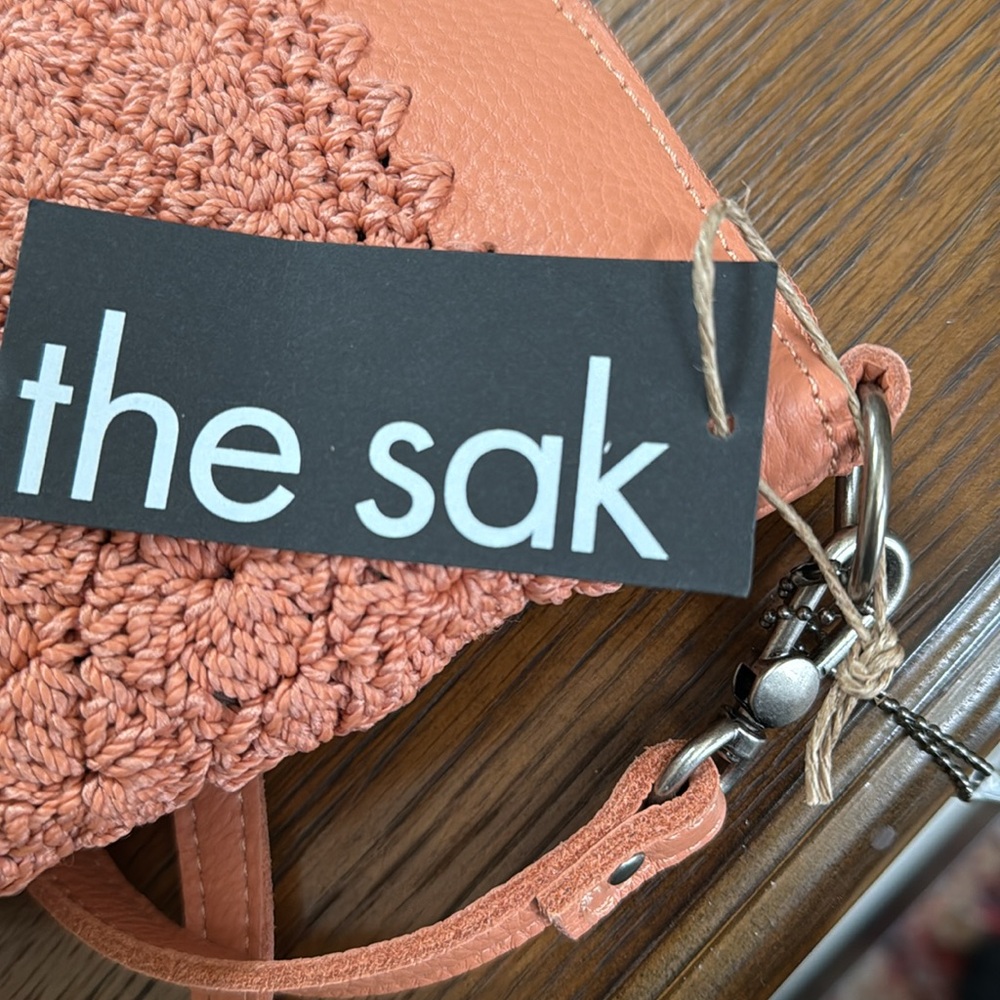 New The Sak women’s crocheted soft peach color crossbody purse. 11”W x 7 1/2” H. - Picture 4 of 14
